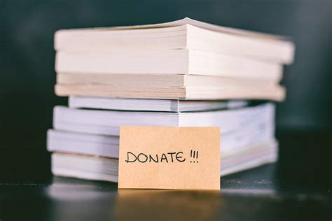 where is the best place to donate used books? Should we also consider the environmental impact?